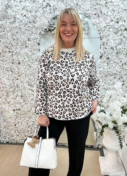 Mimi: Cream leopard print long sleeve knit top. One size: 12-16