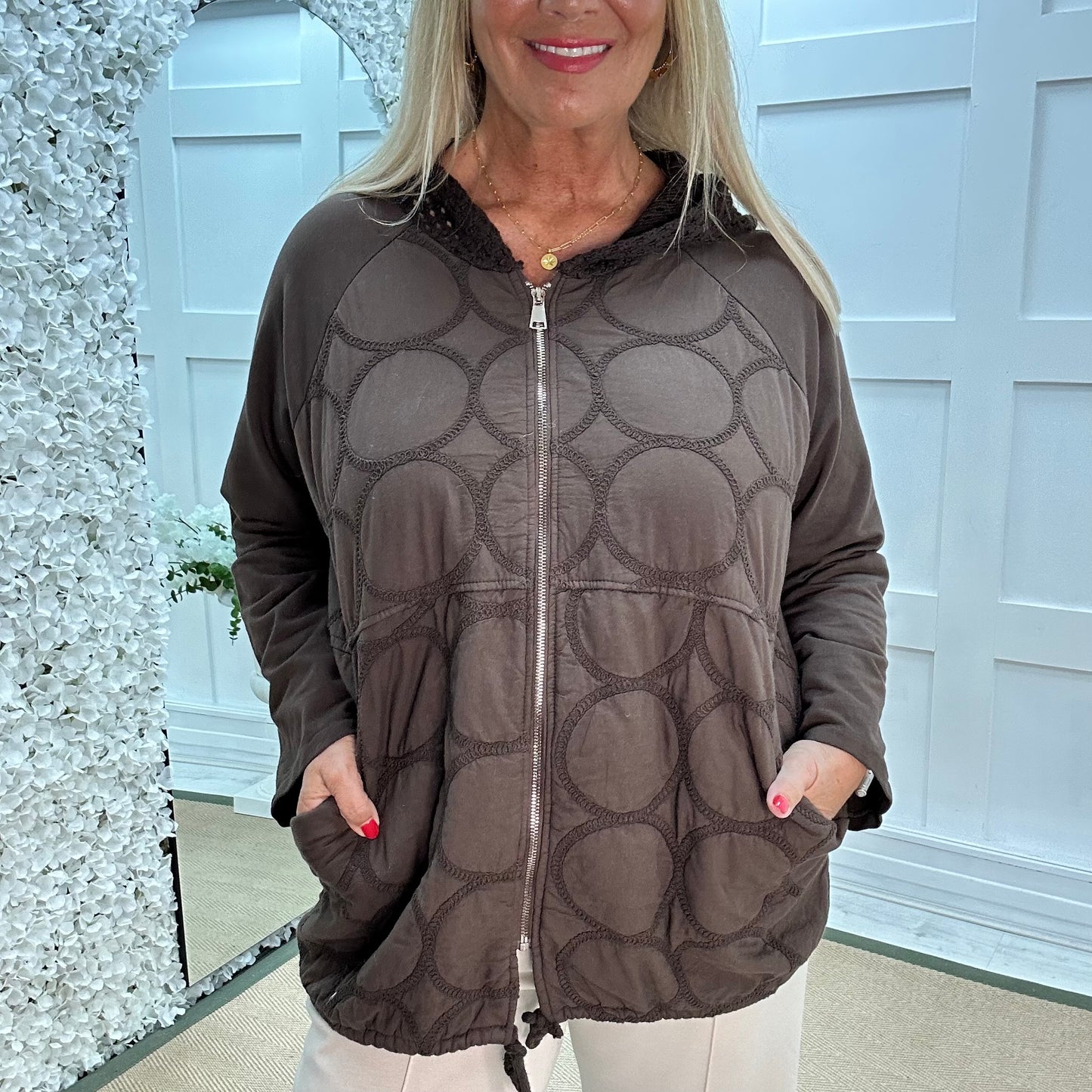 Malin: Brown quilted hooded jacket. One size: 12-20