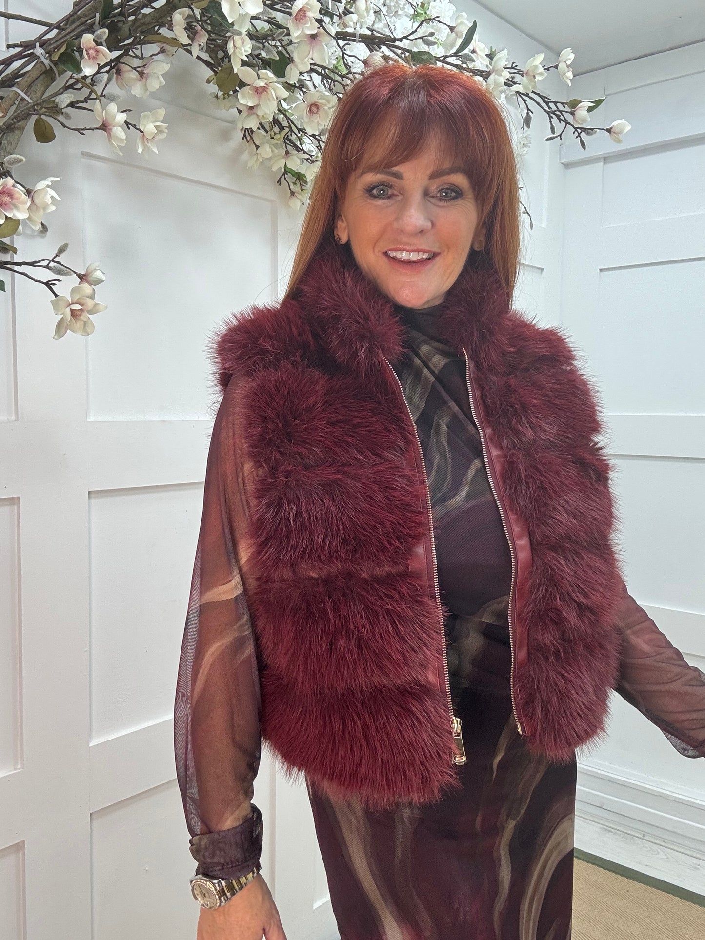 Kizzy: Burgundy zip up faux fur gilet. One size 8-16