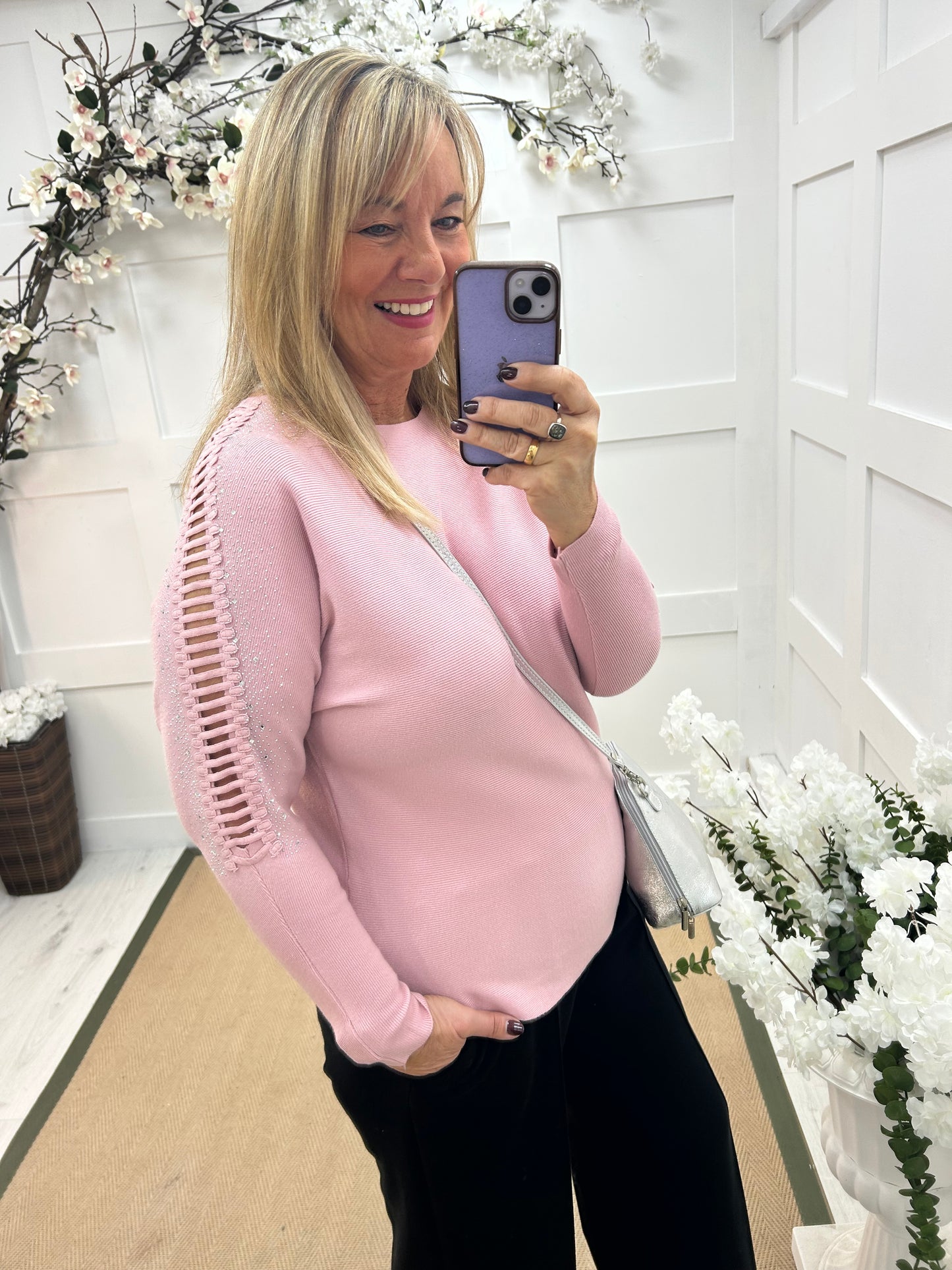 Arianne: Pink sparkle cutout shoulder top. One size: 12-16