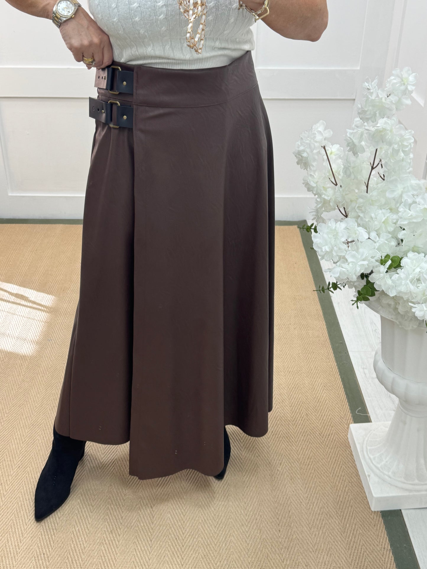 Raine: Brown faux leather belted asymmetric skirt. One size: 12-16