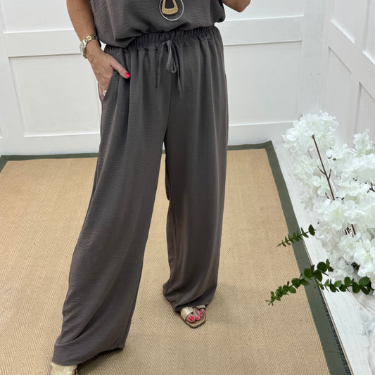 Esme: Taupe pocket wide leg trousers. One size: 12-20