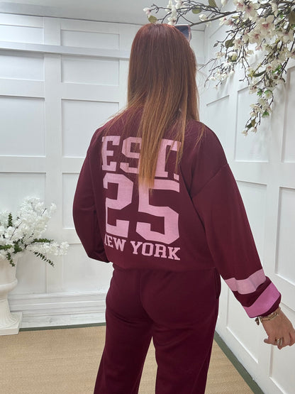 Liberty: Burgundy New York long sleeve top. One size: 12-18