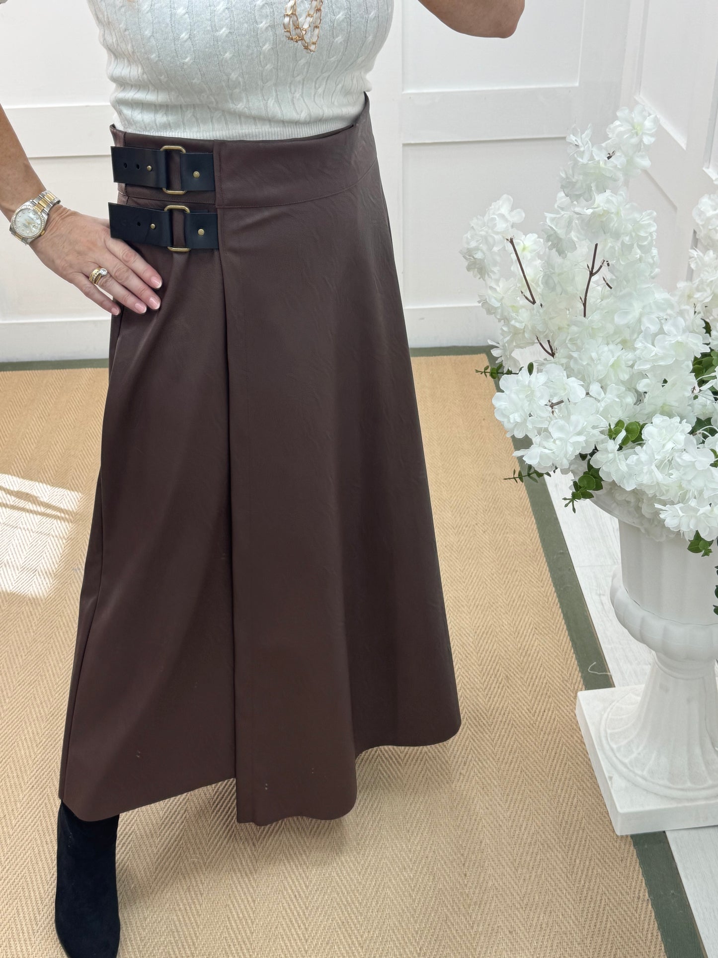Raine: Brown faux leather belted asymmetric skirt. One size: 12-16