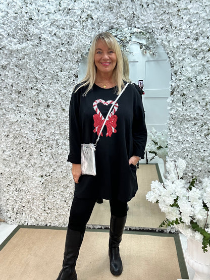 Candice: Black candy cane oversized top. One size: 16-20