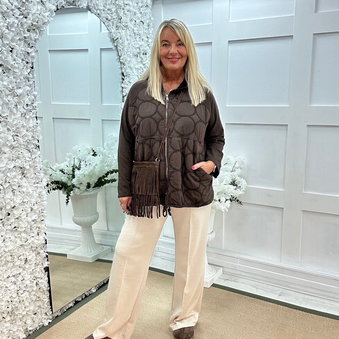Malin: Brown quilted hooded jacket. One size: 12-20