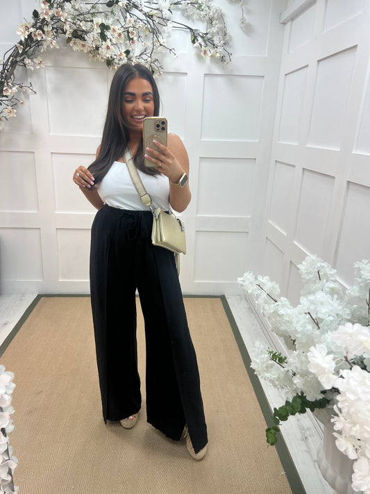 Eden: Black tie waist wide leg trousers. One size: 10-16