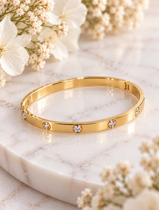 Rivoli luxe: 18K gold plated diamanté bangle