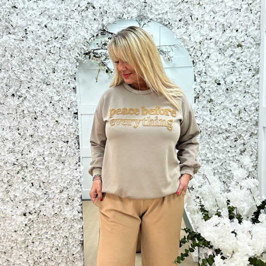 Prya: Mocha oversized Peace slogan sweatshirt. One size: 14-20