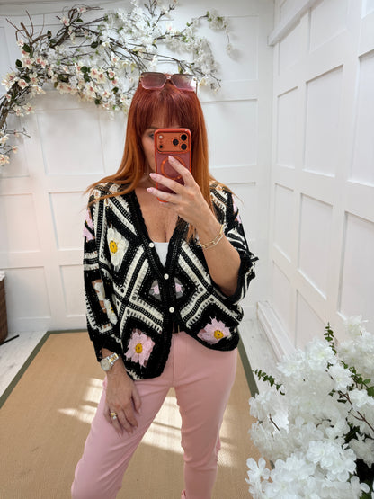 Daisy: Black floral 3/4 sleeve crochet top. One size: 12-18