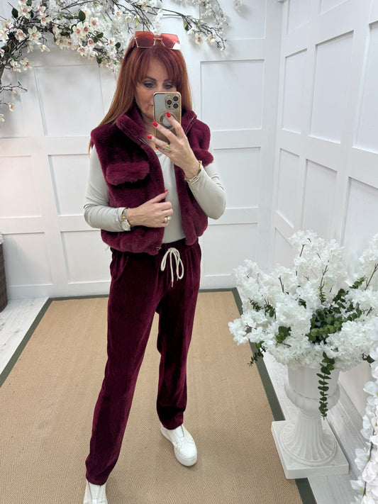 Velma: Burgundy velour trousers. One size: 12-18