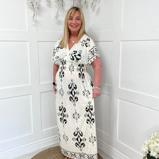 Eva: Stretchy cream & black maxi dress. One size 12-24