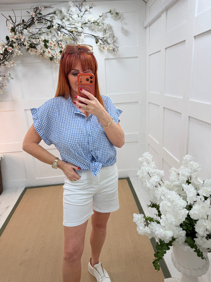 Daisy: Denim white stretchy shorts. Sizes: 8-16