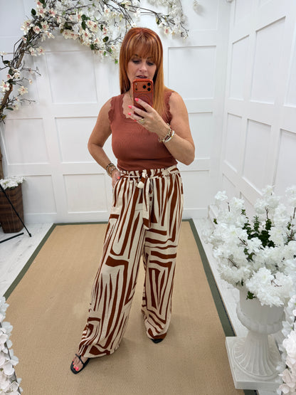 Tanaya: Printed wide leg trousers with belt. One size: 10-16. 4 colours