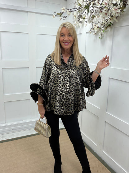 Lauren: Leopard print metallic shirt with statement sleeves. One size: 14-20. 2 colours