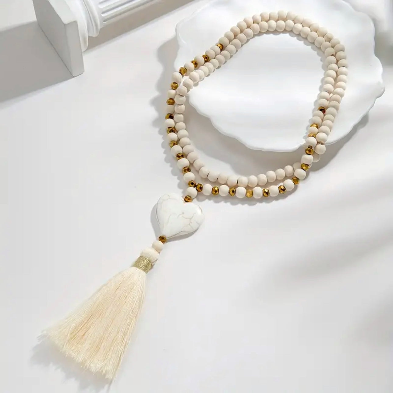 Jedda: Long white & gold bohemian heart necklace