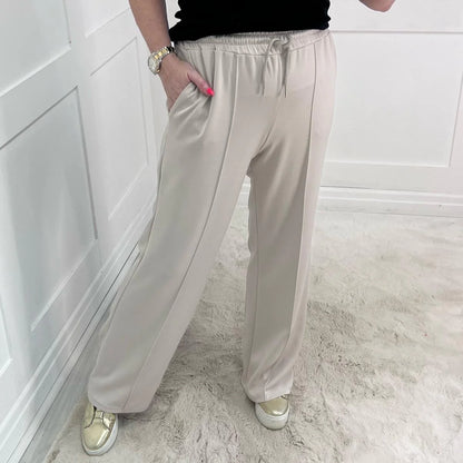 Trudy (Short): Cream stretchy wide leg pocket trousers. One size 10-16