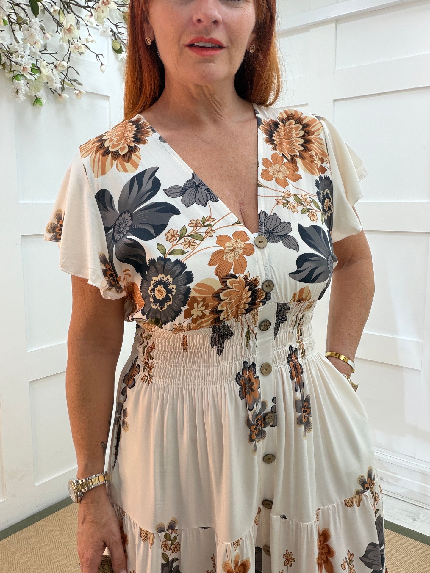 Aubrey: Cream & orange floral stretchy midi dress. One size: 10-18