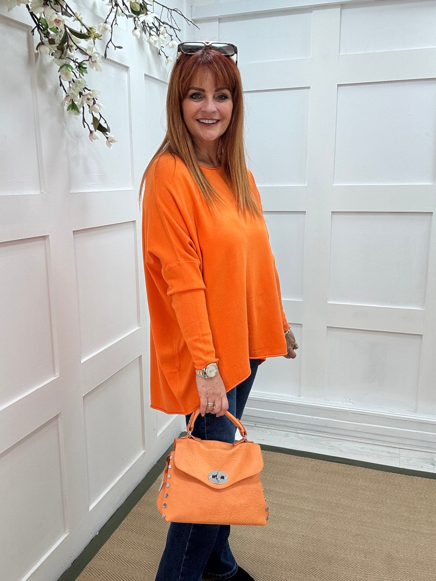 Maddie: Orange oversized long sleeve top. One size: 12-18