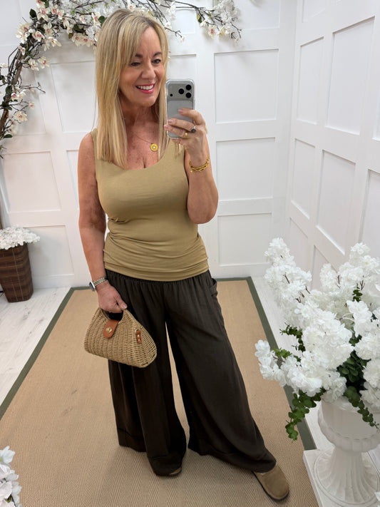 Candi: Brown shirred waist wide leg pocket trousers. One size: 10-18