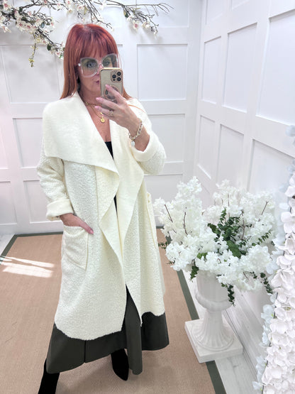 Kathie: Winter white boucle coat with pockets. One size 12-18
