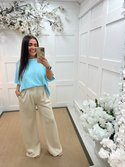 Carrie: Blue short knitted top. One size: 12-18/20