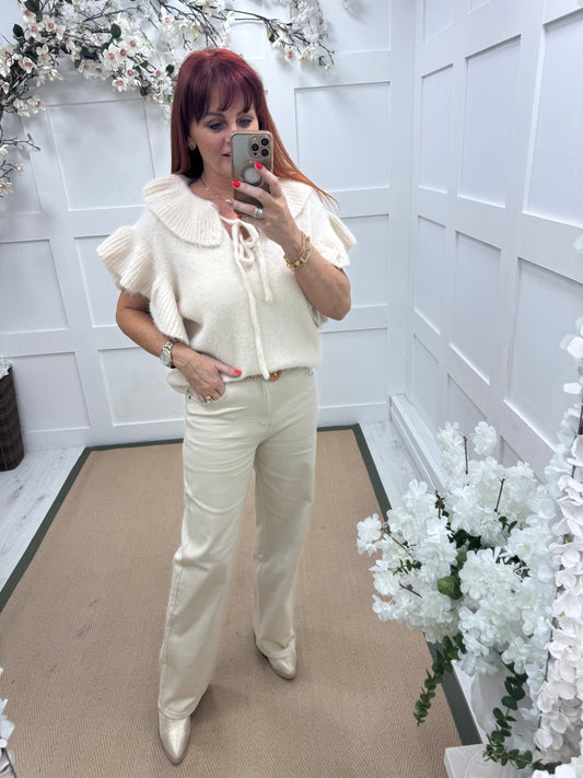 Cora: Cream wide leg jeans. Sizes: 10-20
