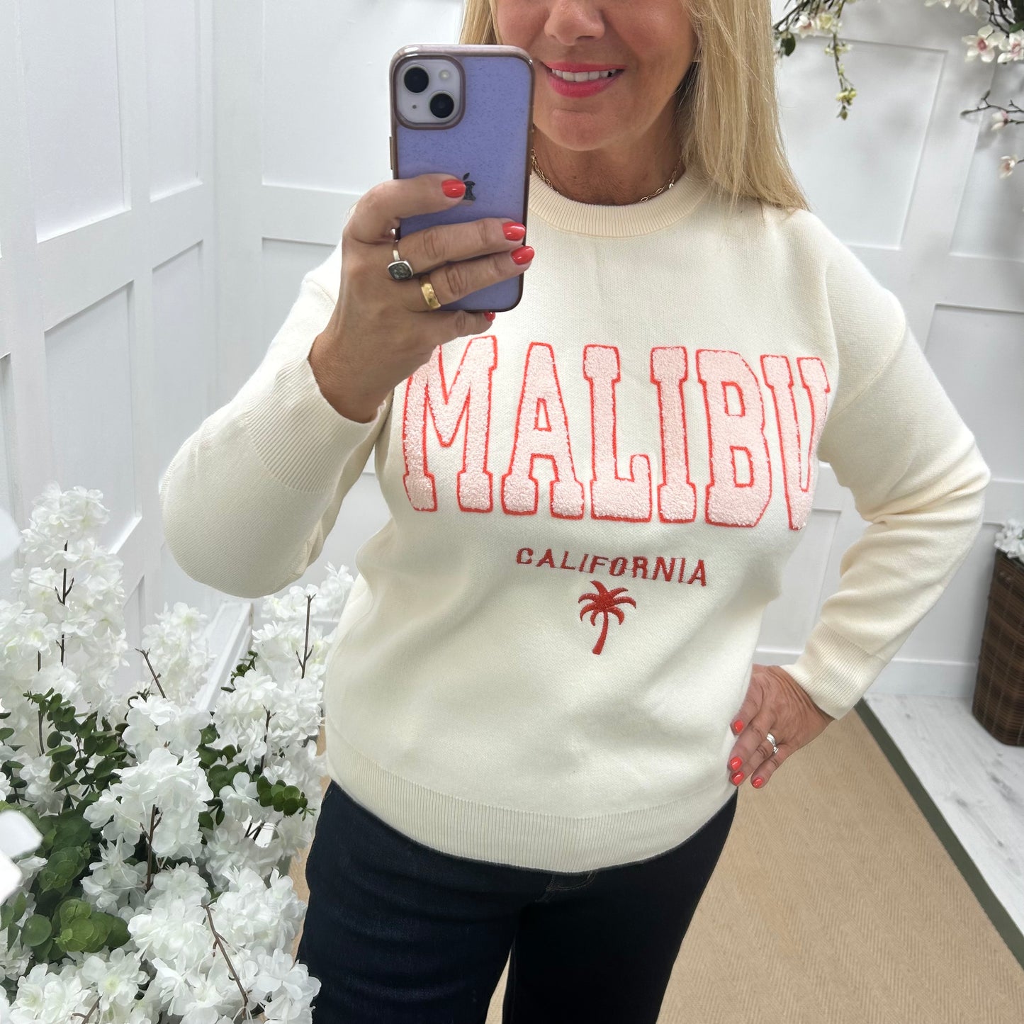 Melody: Cream textured MALIBU logo knitted top. One size 10-18