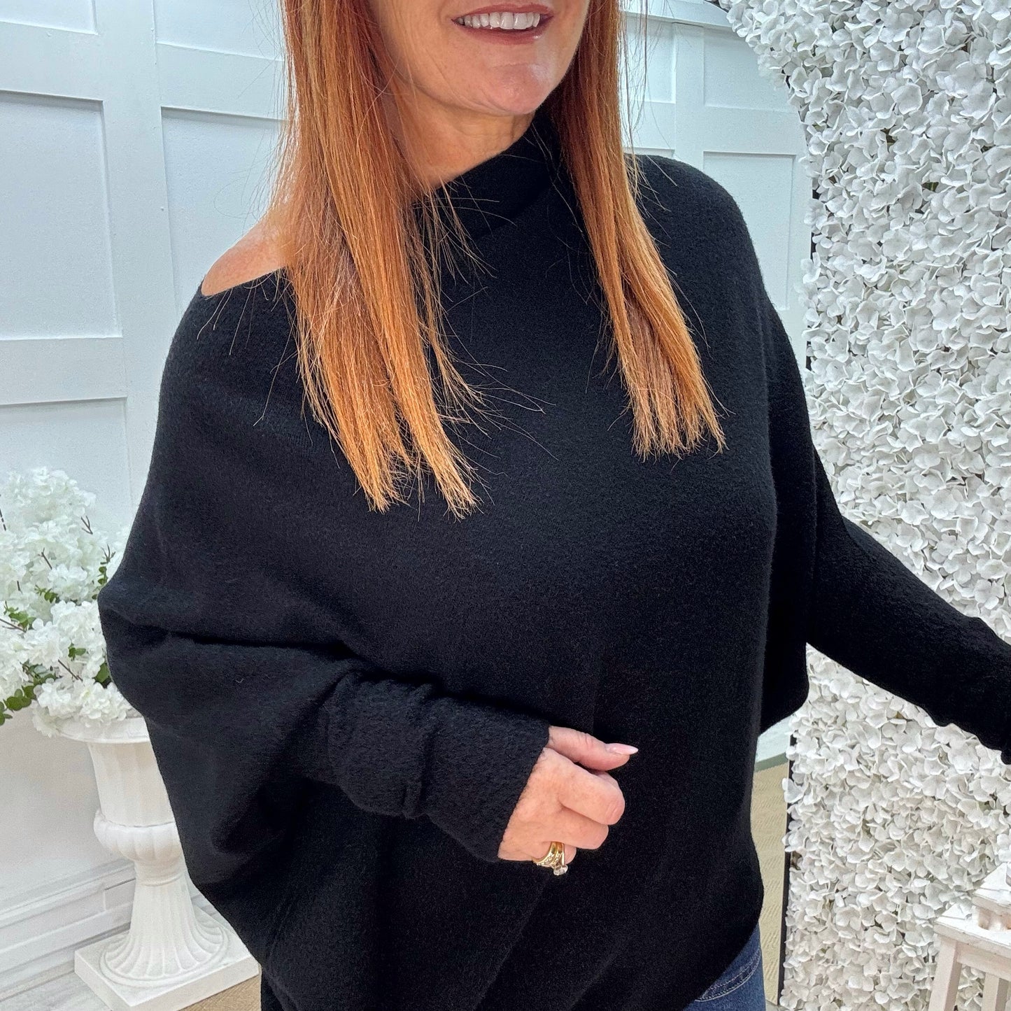 Erica: Black asymmetrical slouch soft knit top. One size 10-18