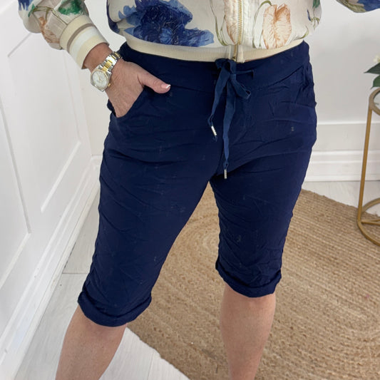 Millie: Navy stretchy magic shorts. One Size 10-18