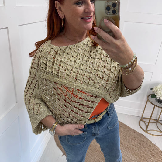 Maggie: Gold pattern stretchy lurex wrap top. One size: 10-18