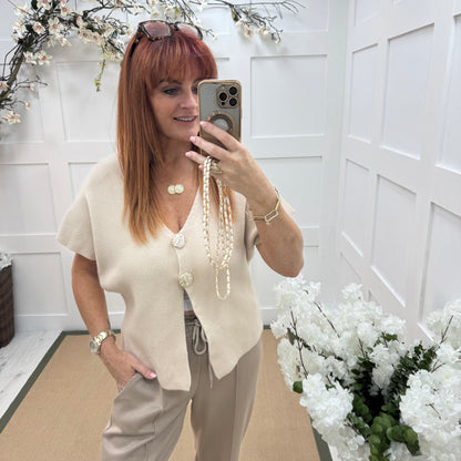 Sammi: Cream V neck gold button top. One size: 10-16
