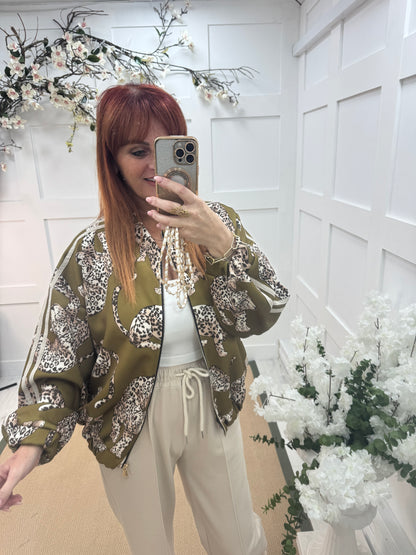 Macey: Olive green leopard printed bomber jacket. One size: 14-20