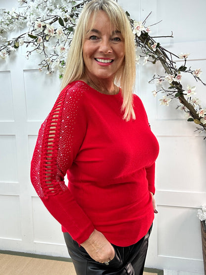 Arianne: Red sparkle cutout shoulder top. One size: 12-16