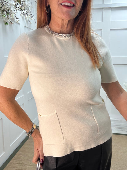 Rosheen: Winter white rhinestone pocket top. One size: 8-14