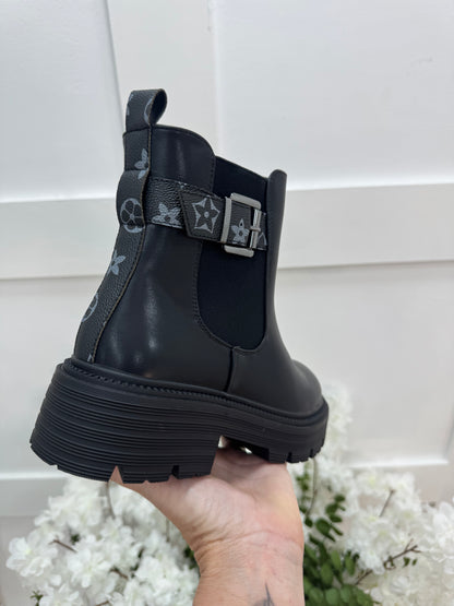 Larrie: Black designer inspired chelsea boots. Sizes 3-8.