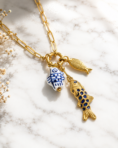Dory: 18k gold plated multi fish necklace.