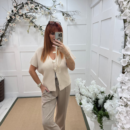 Sammi: Cream V neck gold button top. One size: 10-16