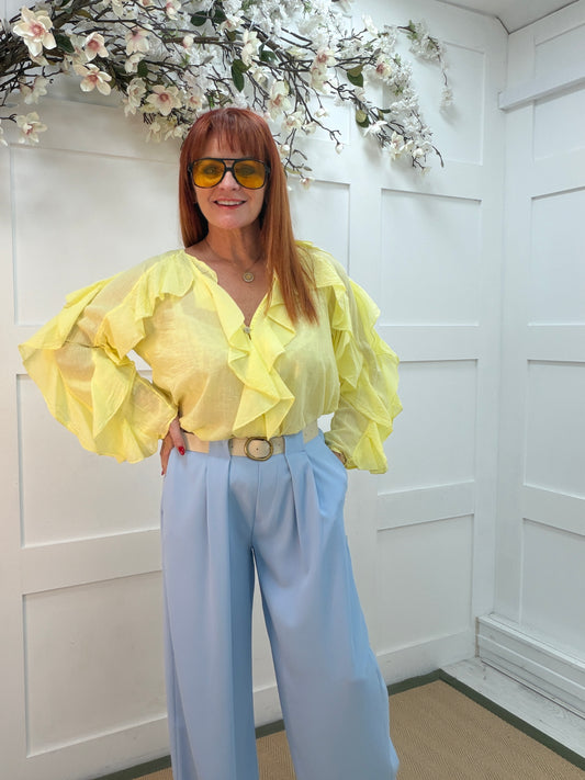 Rowan: Lemon V neck ruffle blouse. One size 10-16