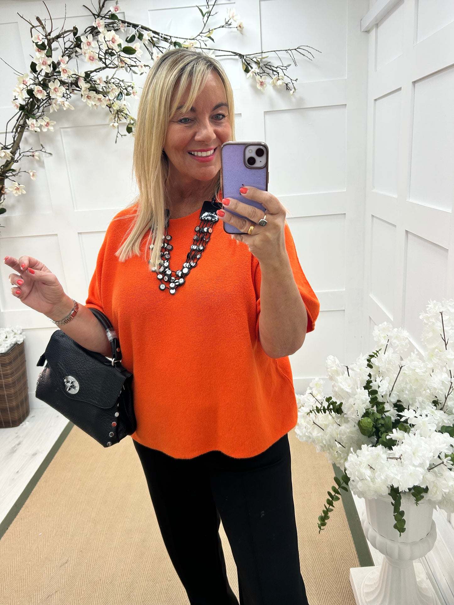 Carys: Orange short knitted top. One size: 12-18/20