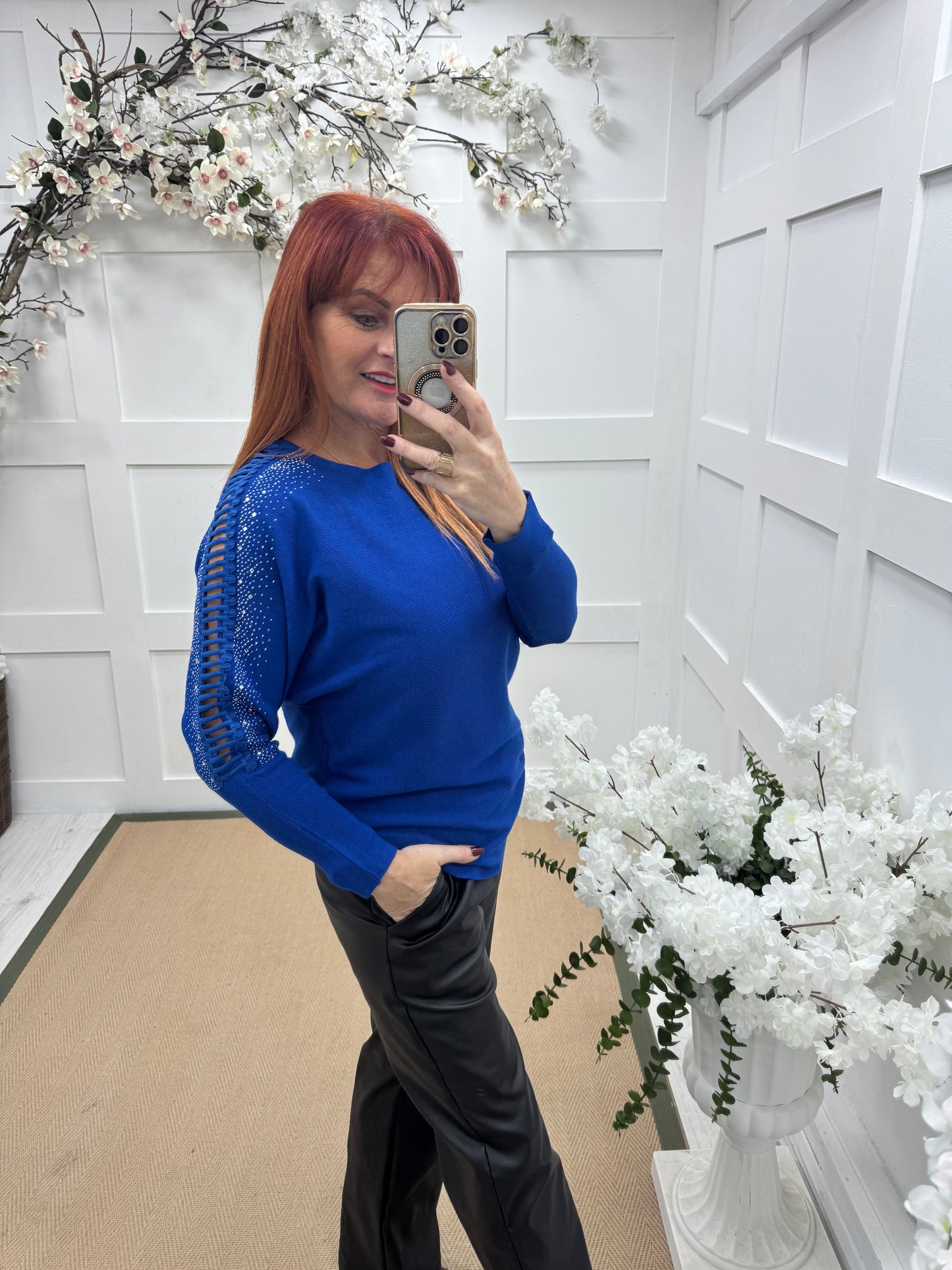 Arianne: Blue sparkle cutout shoulder top. One size: 12-16