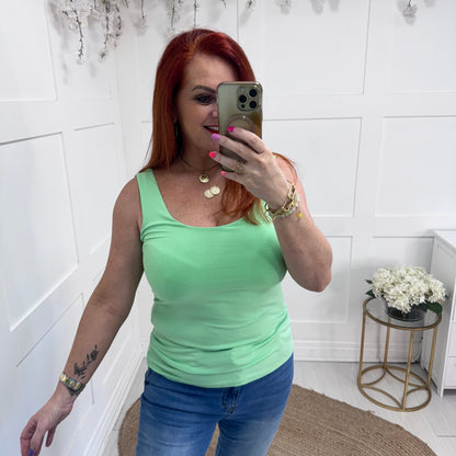 Abigail: Stretchy basic mint green vest top. 2 sizes