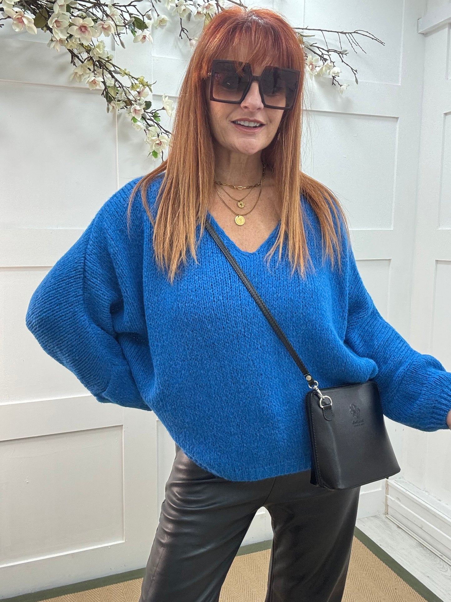 Alex: Blue V neck knitted top. One size 14-20