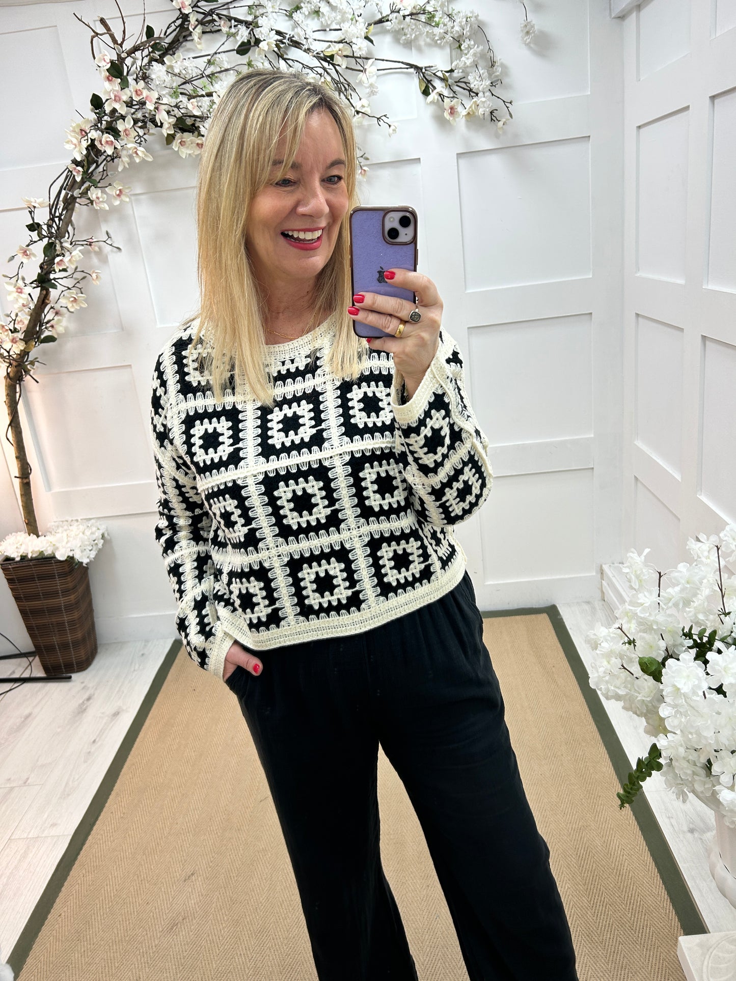 Carly: Black and cream long sleeve crochet top. One size: 14-18