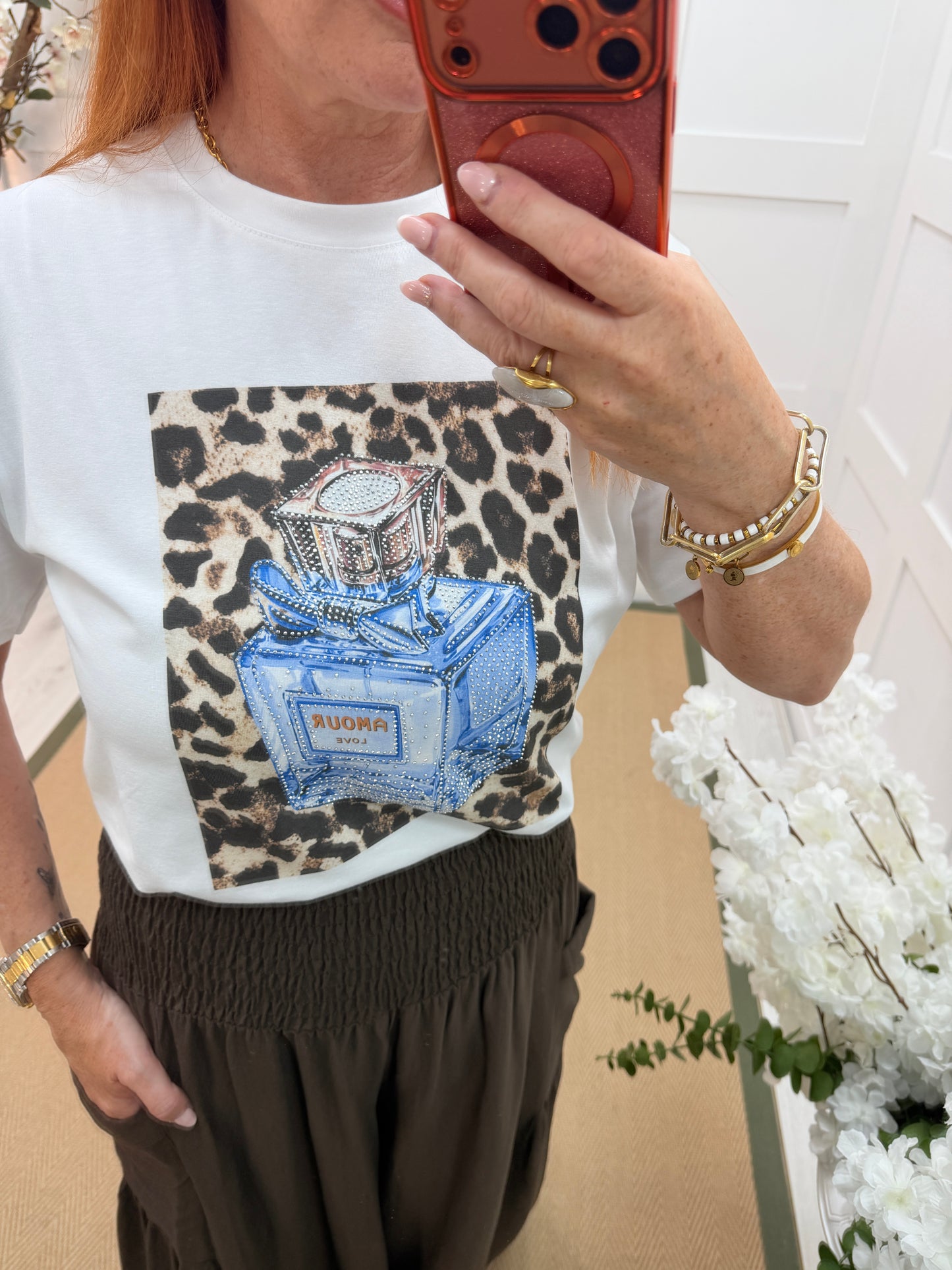 Stella: White diamanté leopard print perfume T shirt. One size: 12-18