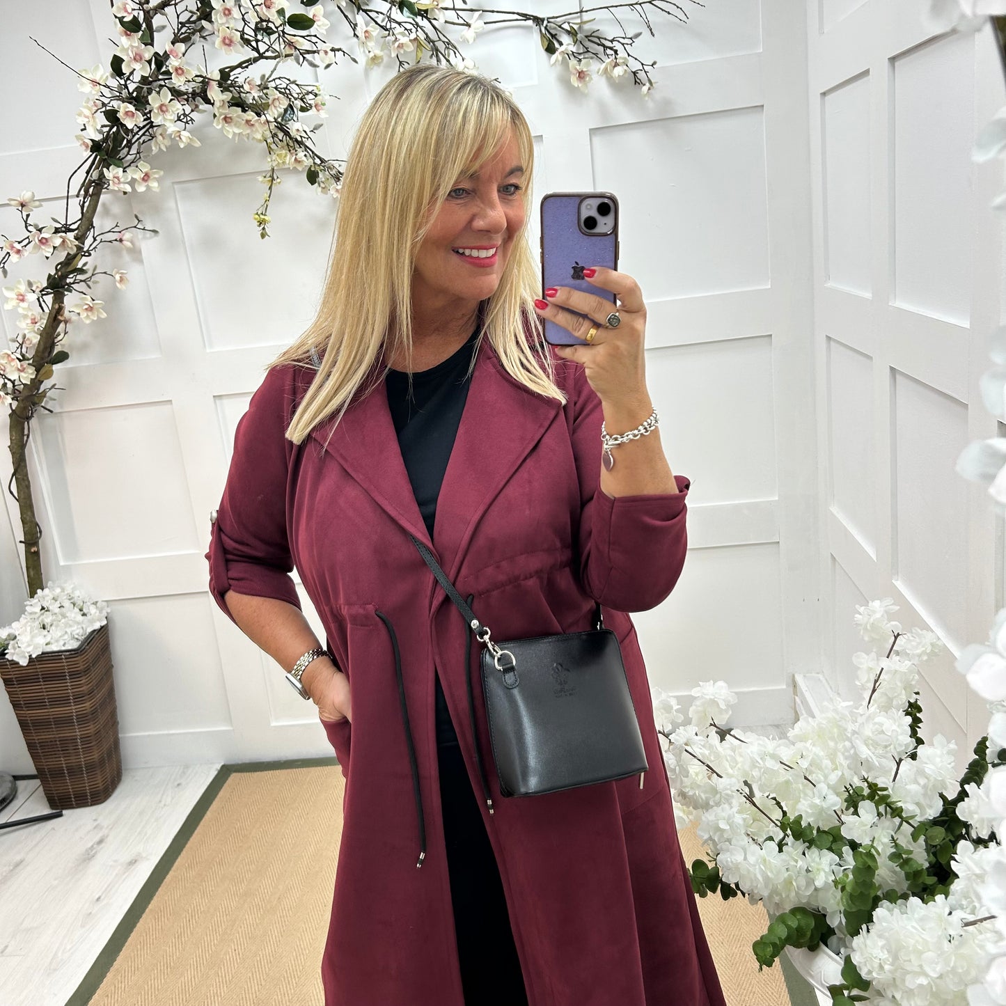 Marina: Burgundy long suedette trench coat. One size 12-18