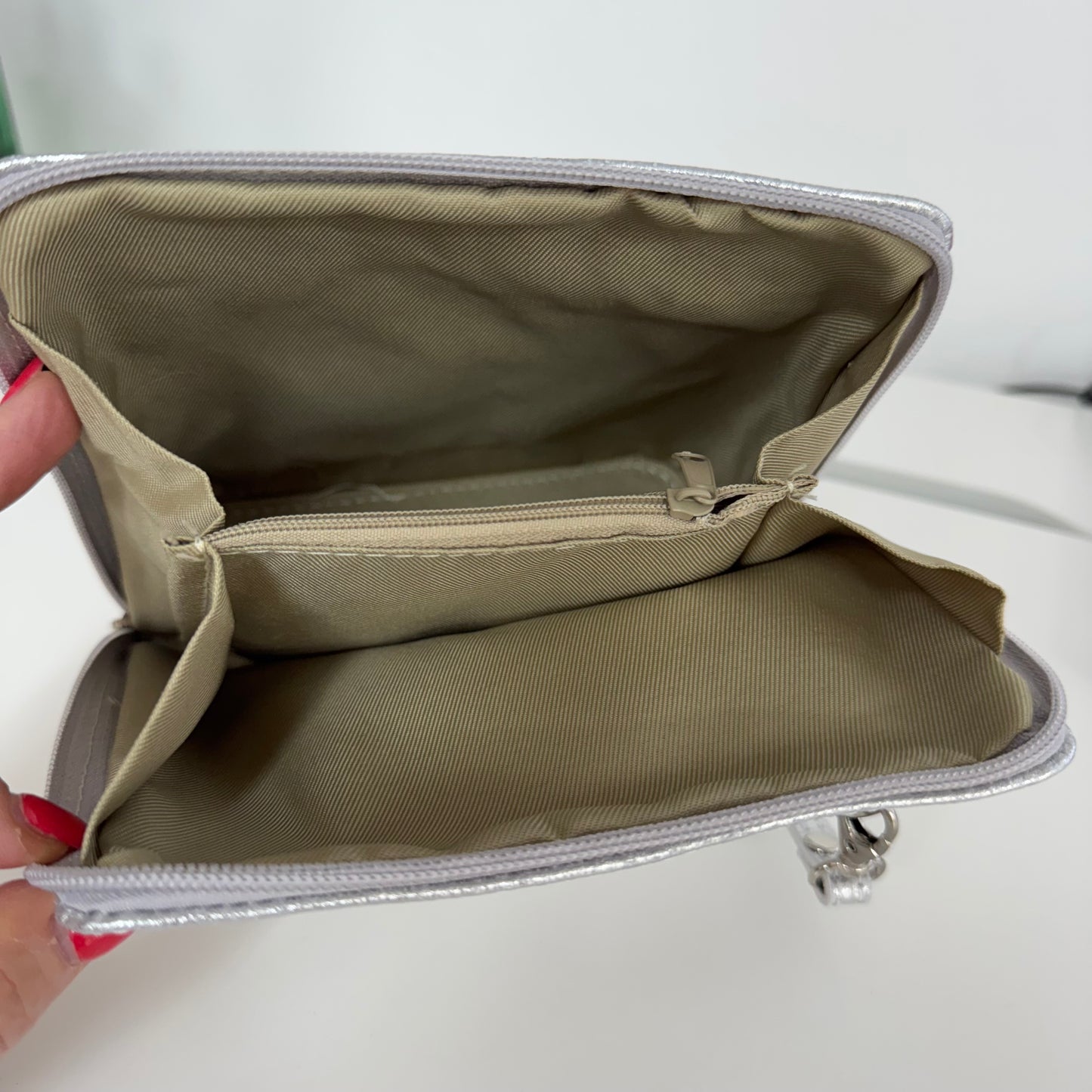 Thea: Silver leather cross body/clutch bag.