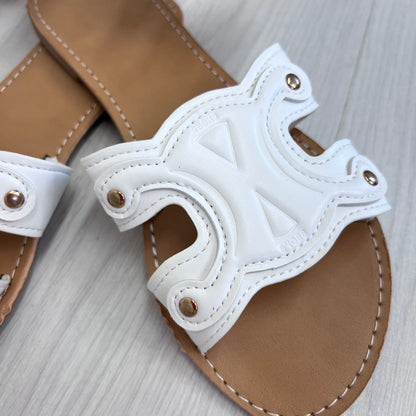 Lucia: white cut out style sliders. Sizes: 4-9
