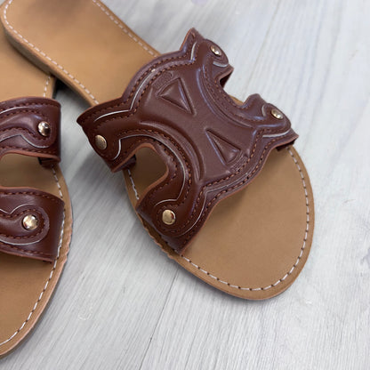 Lucia: Tan cut out style sliders. Sizes: 4-9