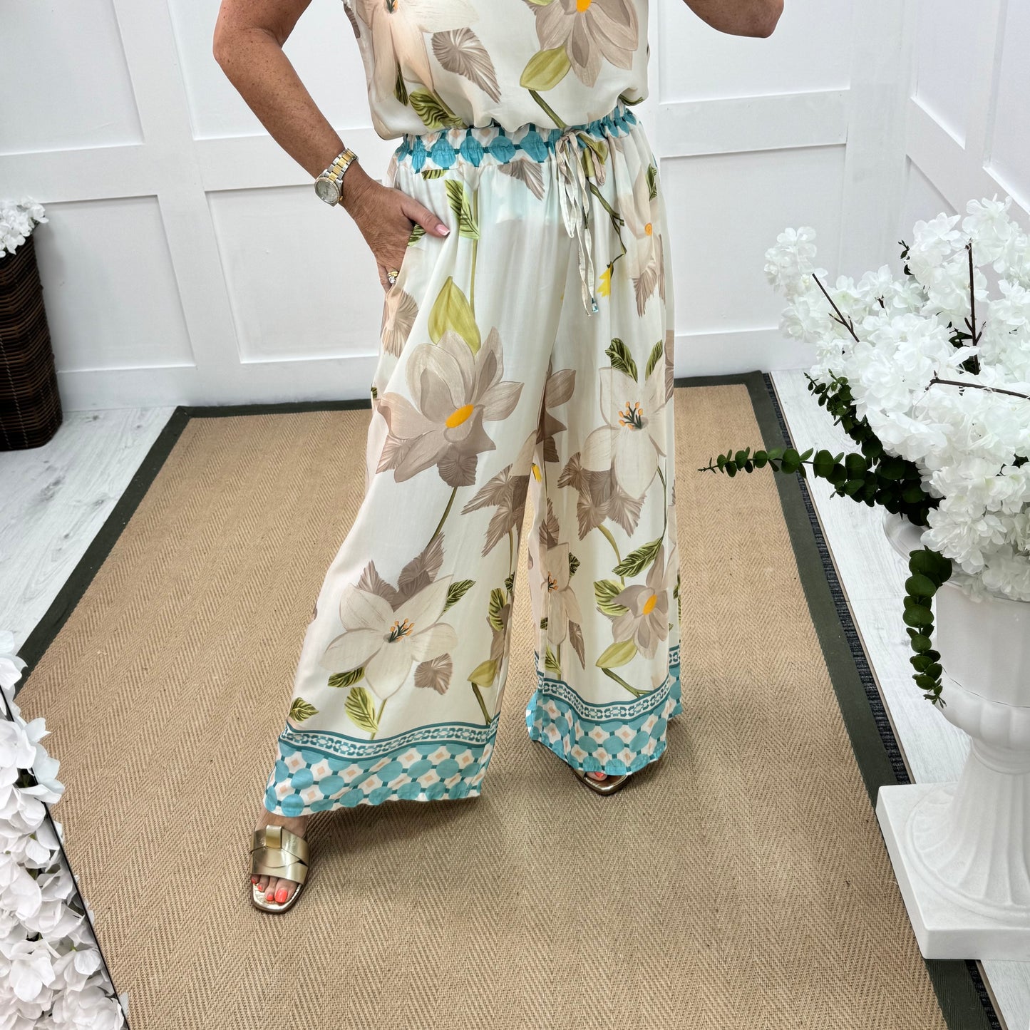 Bianca: Blue silky floral print wide leg trousers. One size: 10-16/18